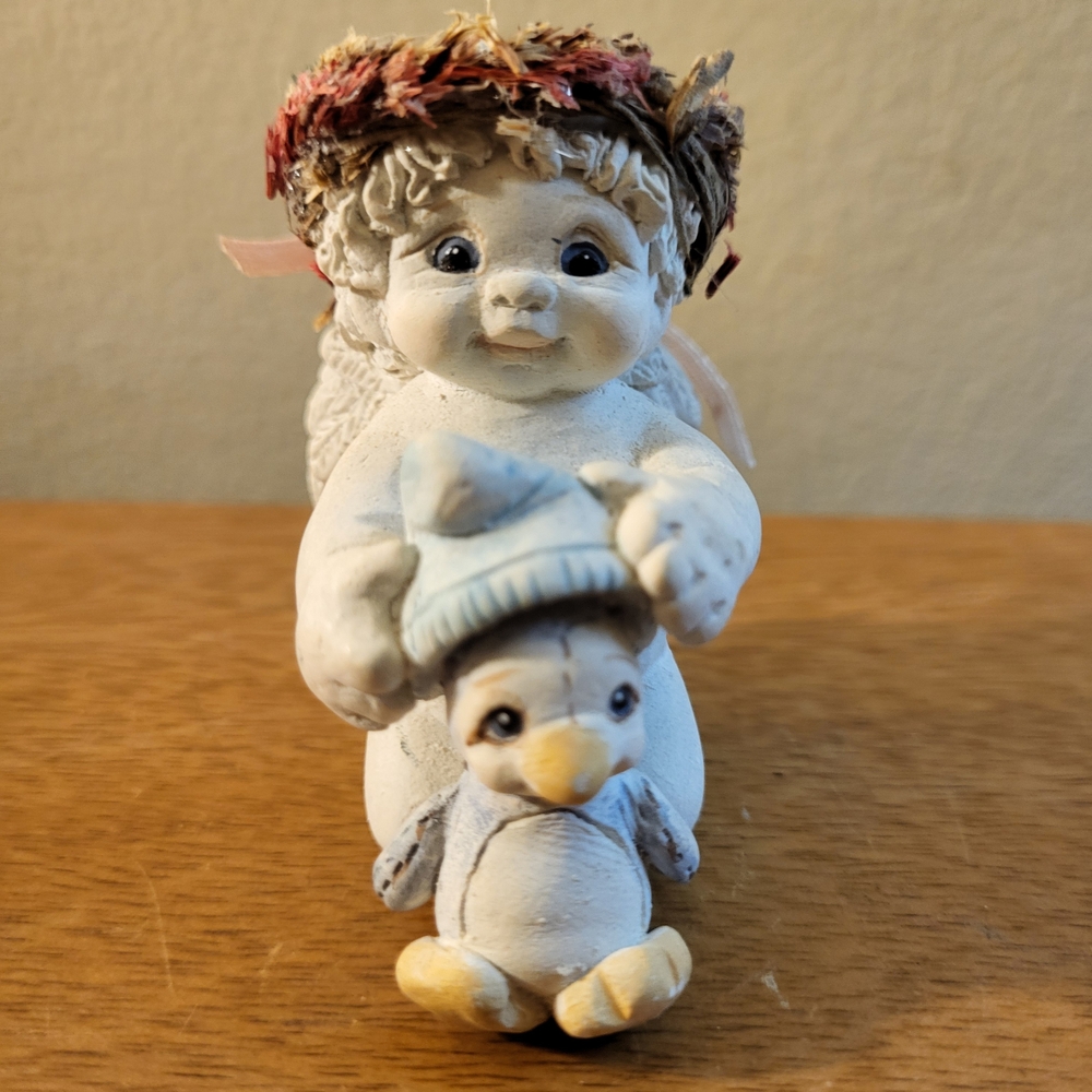 Dreamsicles Cherub Angel Figurine With Baby Duck Or Penguin.